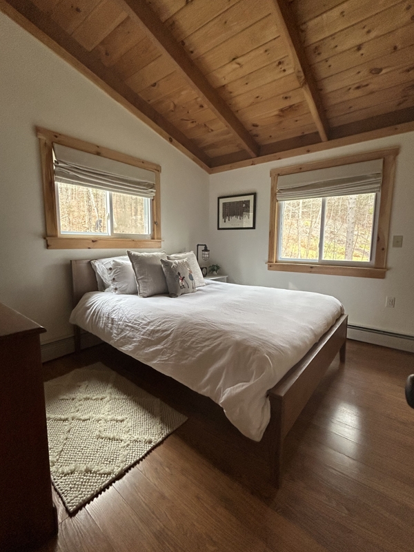 Primary bedroom. Queen bed. Blackout shades.