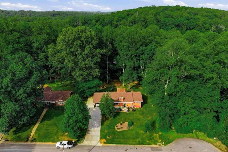 Secluded lot on a tranquil street at the end of a hidden neighborhood. To the right is Blackwater Creek Natural area and access to Blackwater Creek Trail is behind the house.