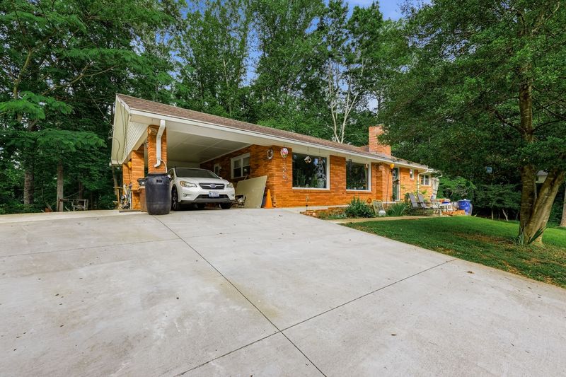 Double-wide driveway ensures that all guests have easy access.