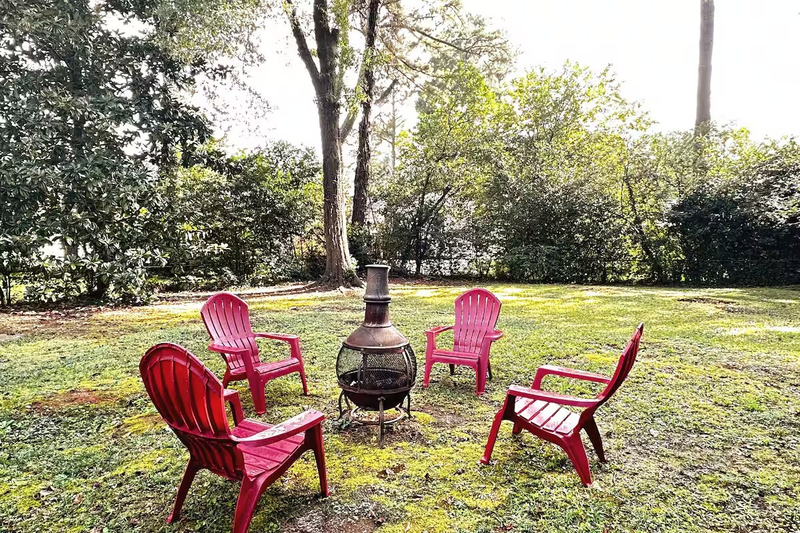 Relax and enjoy a night by the fire in the private, fenced back yard