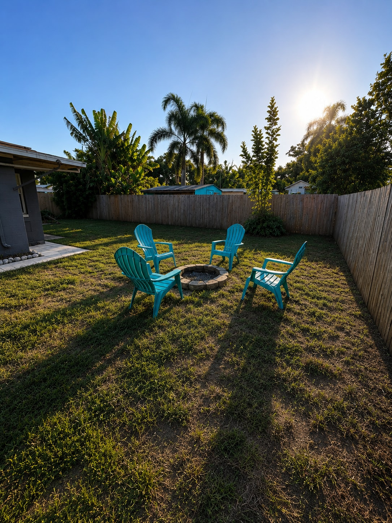 Enjoy a fully fenced backyard with plenty of space to relax, play, or gather around the fire pit.